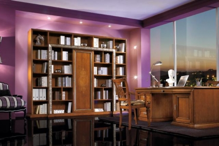 libreria con cornicione intagliato e porta con intarsio